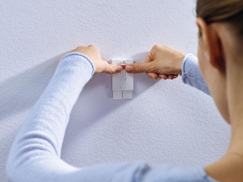 Tesa - Verstellbarer selbstklebender Nagel für alle Wandarten (max. 2x2kg)